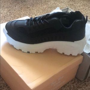 Black platform sneakers